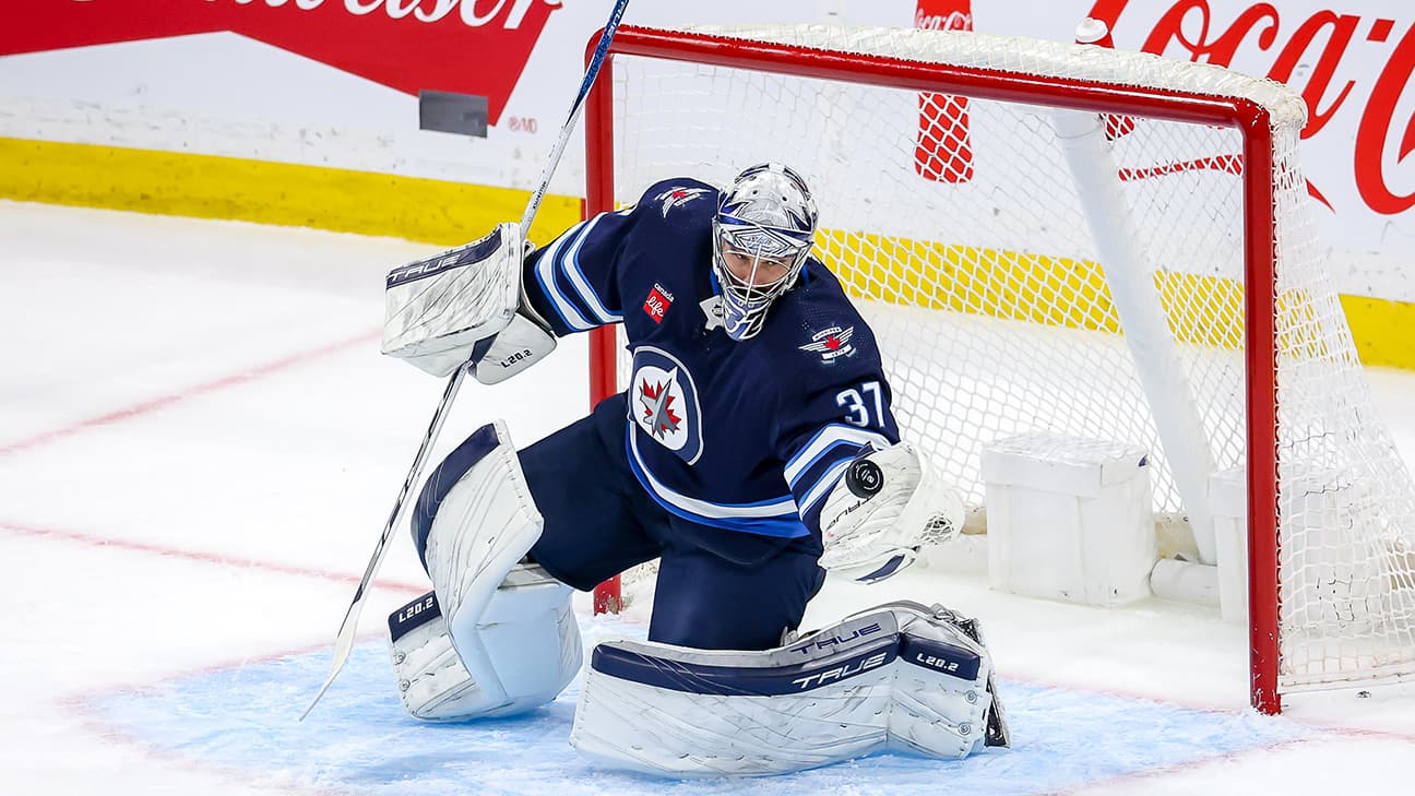 Connor Hellebuyck action shot